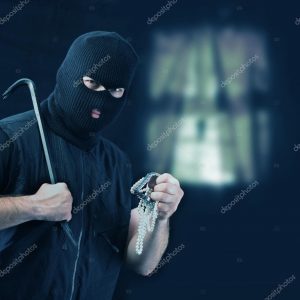 depositphotos_29432575-stock-photo-masked-thief-stealing-jewelry